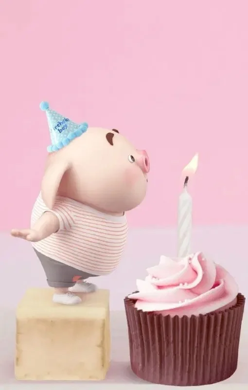 Mô hình hà mã đội mũ sinh nhật bên bánh cupcake màu hồng